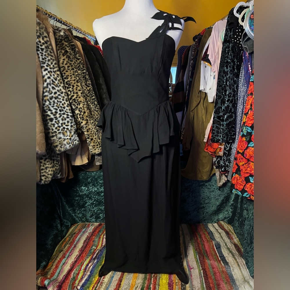 Vintage peplum dress with flower accent strap